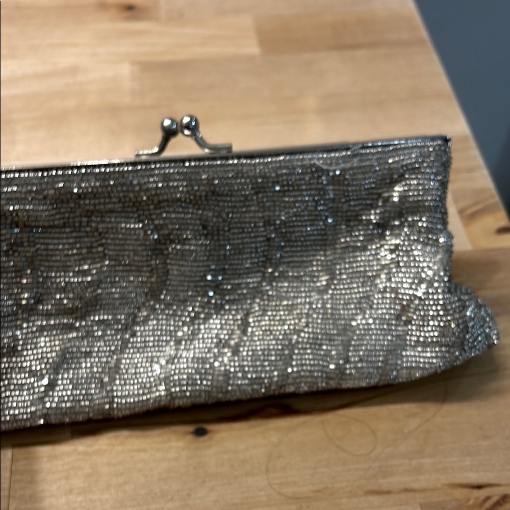 Glamorous Silver Clutch with Sequins and Metal Frame